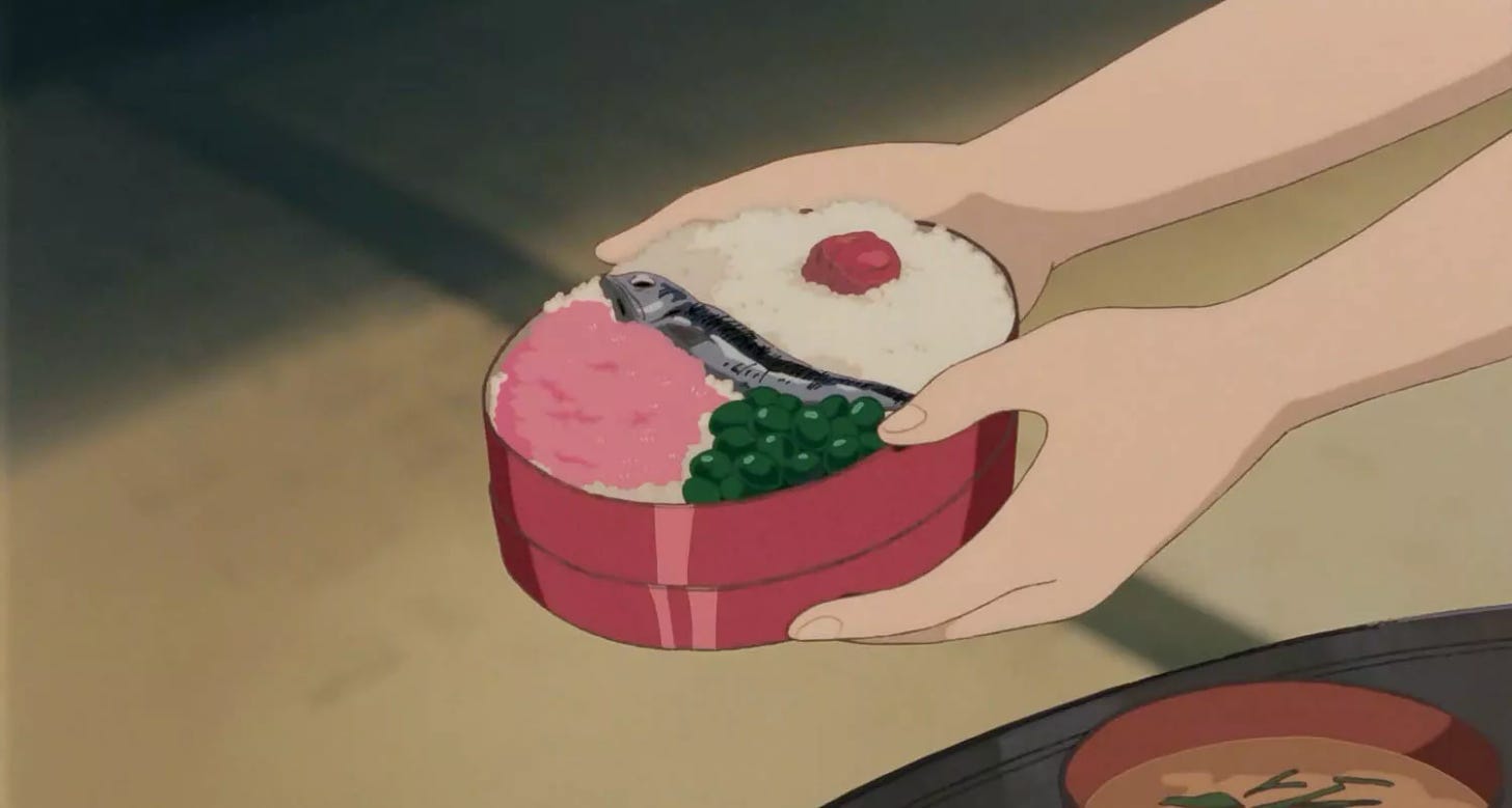 Bento box with rice, umeboshi, shishamo, steamed soy beans, and sakura denbu from Studio Ghibli film My Neighbor Totoro