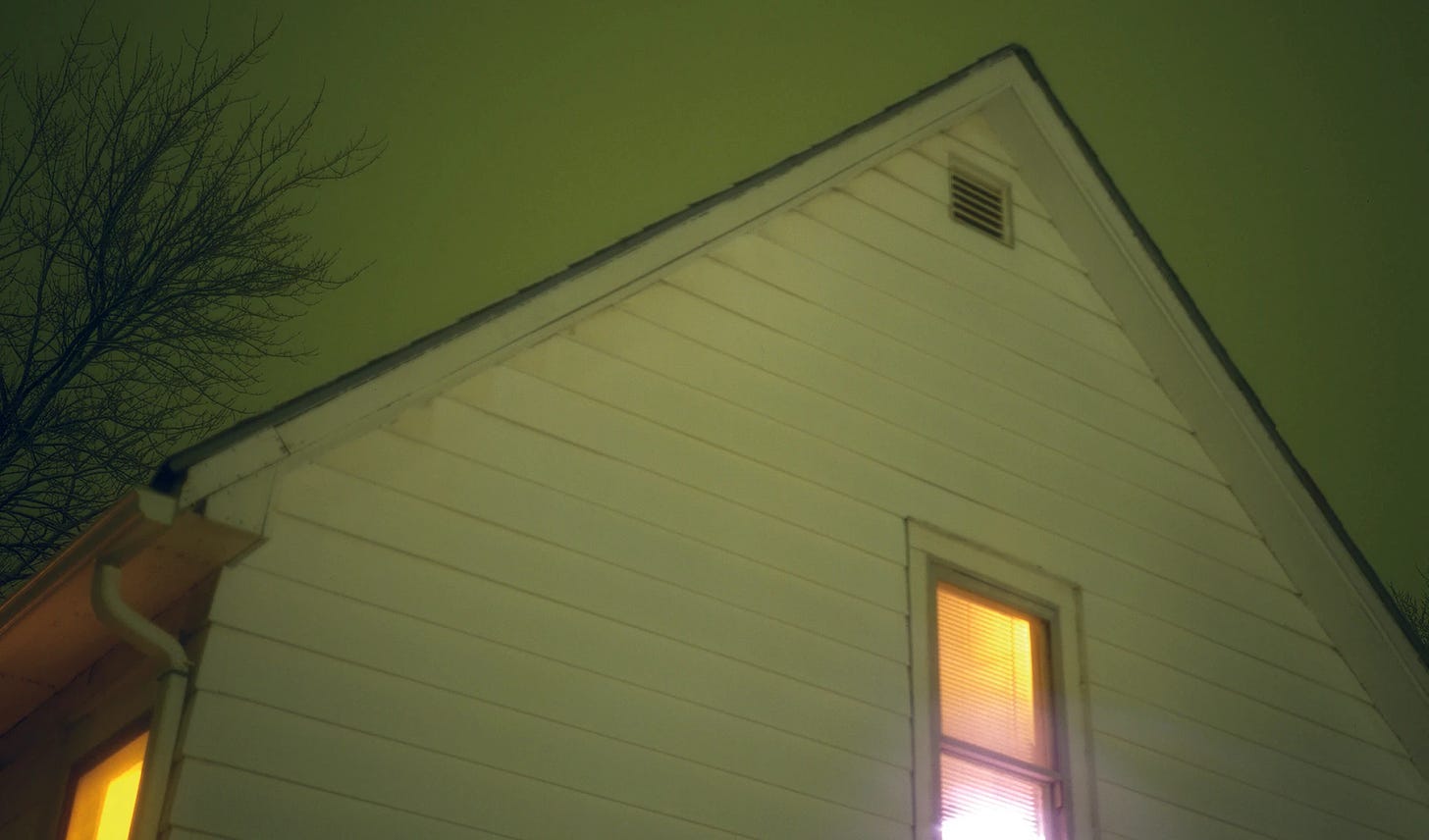 Album cover to the band American Football's album "LP1," which features a standard white Midwestern house