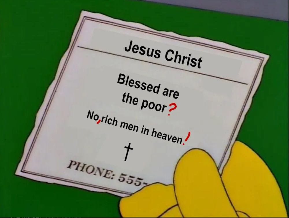 A cartoon hand holds a piece of paper. On it is written Jesus Christ. Blessed ar the poor. No rich men in heaven. The paper has been corrected with red pen to read "Blessed are the poor? No, rich men in heaven!