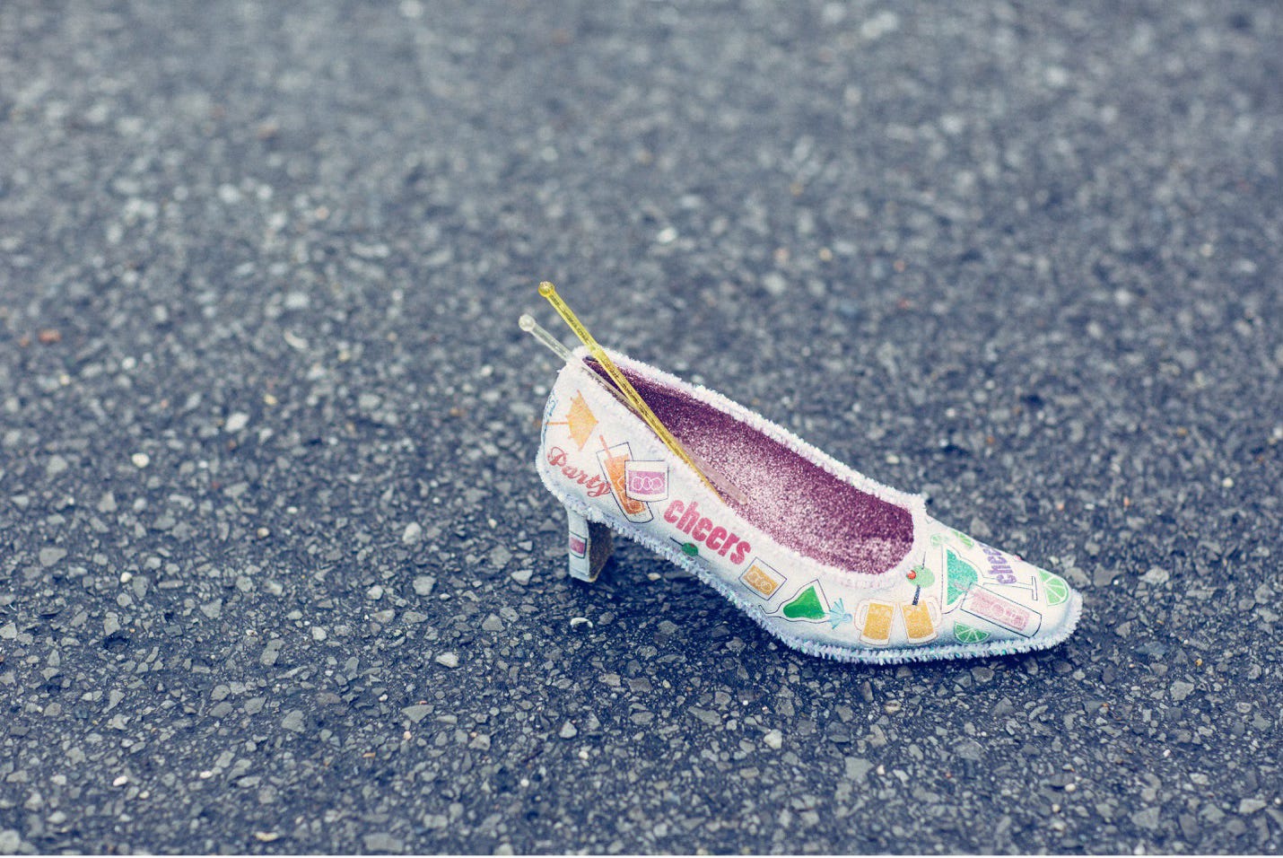 A woman's high-heeled shoe decorated and ready to be thrown in the Muses Mardi Gras parade.