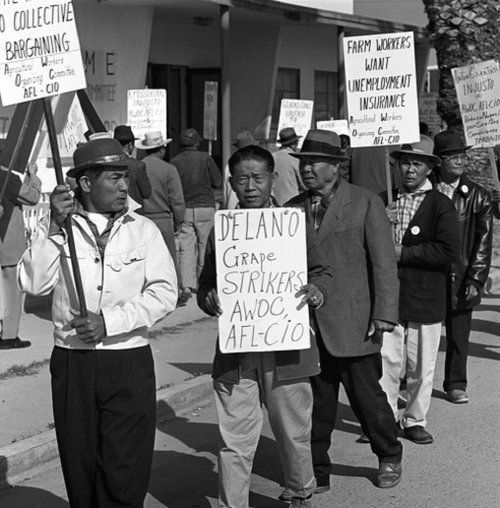 Black and white image of grape workers striking