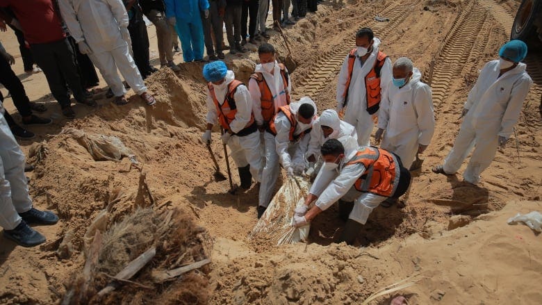 UN rights chief calls for independent investigation as more bodies  recovered from Gaza mass graves | CBC News
