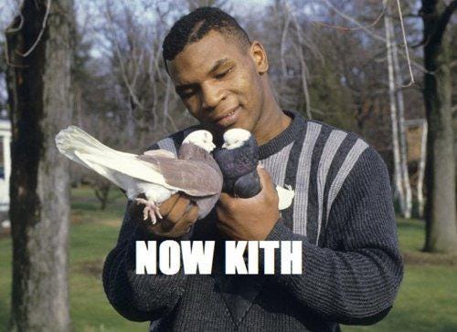 Mike Tyson holding two pigeons towards each other as if trying to make them kiss. The image is captioned "now kith." Mike Tyson holding two pigeons towards each other as if trying to make them kiss. The image is captioned "now kith."