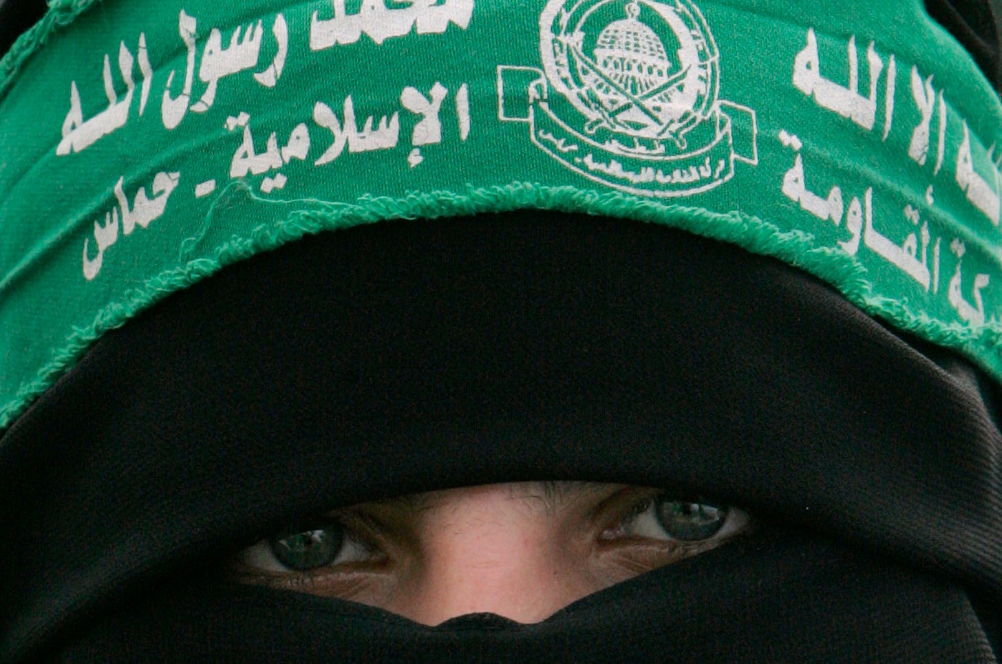 A Palestinian Hamas supporter attends a protest against Israel's attacks on the Gaza Strip, in Gaza City, Monday, March 3, 2008.
