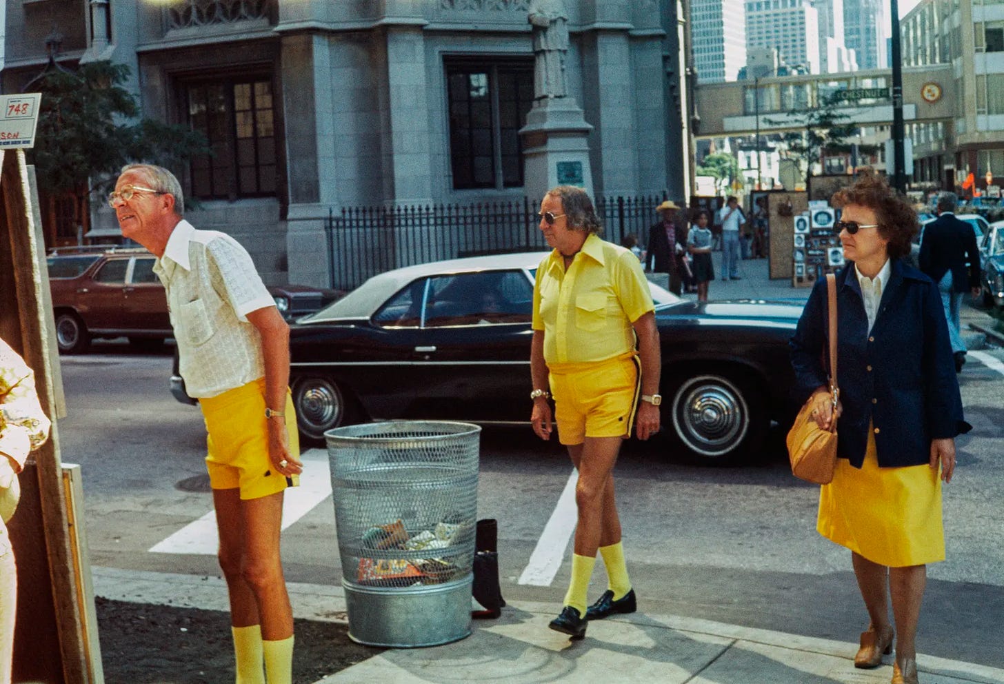 A group of men wearing yellow shorts and matching yellow socks

Description automatically generated