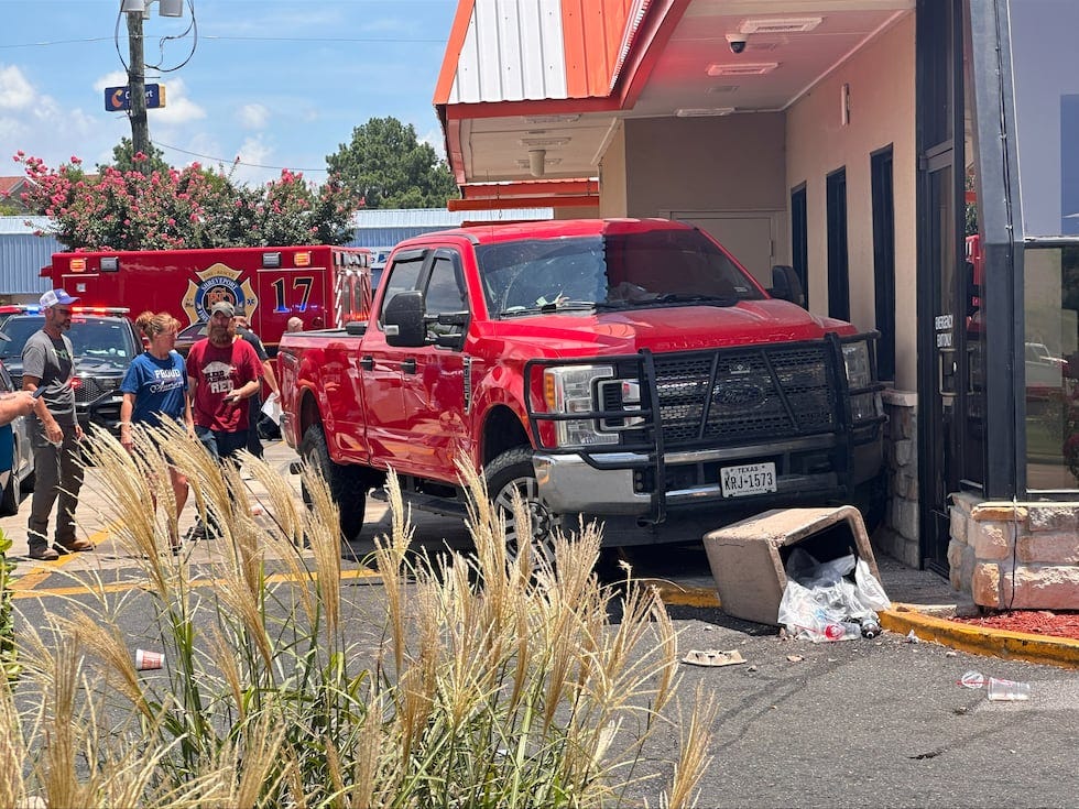 A person in the drive-thru at Whataburger on Pines Road has a medical emergency.