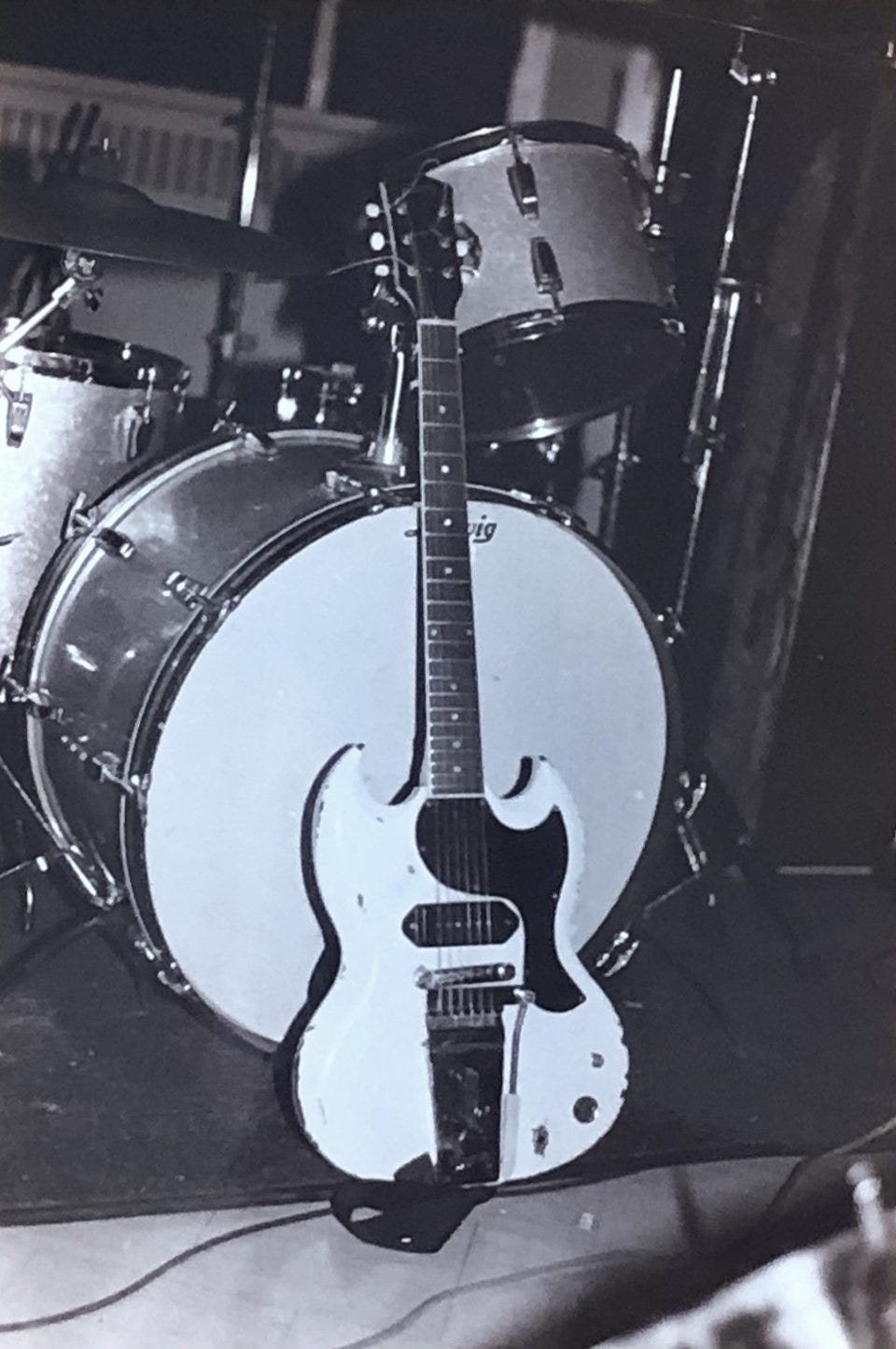 Rex John Shelverton's white, chipped paint SG Junior Guitar.