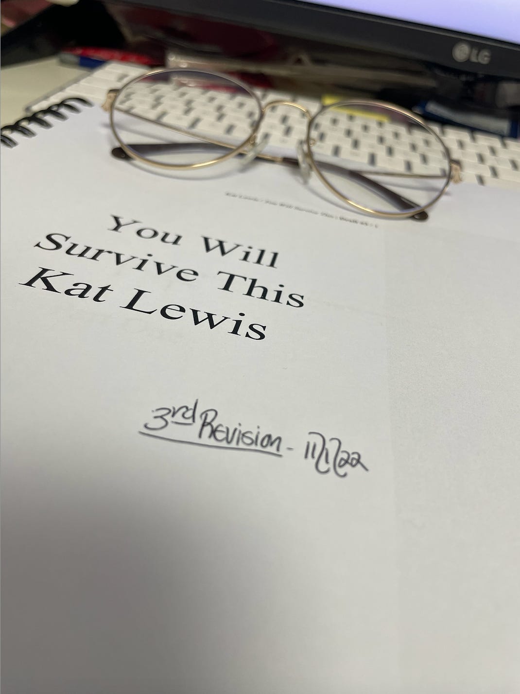 A photo of the title page for Kat’s printed manuscript of You Will Survive This. It’s dated November 1, 2022.