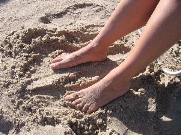 872 The feeling of scrunching sand in your feet - 1000 Awesome Things