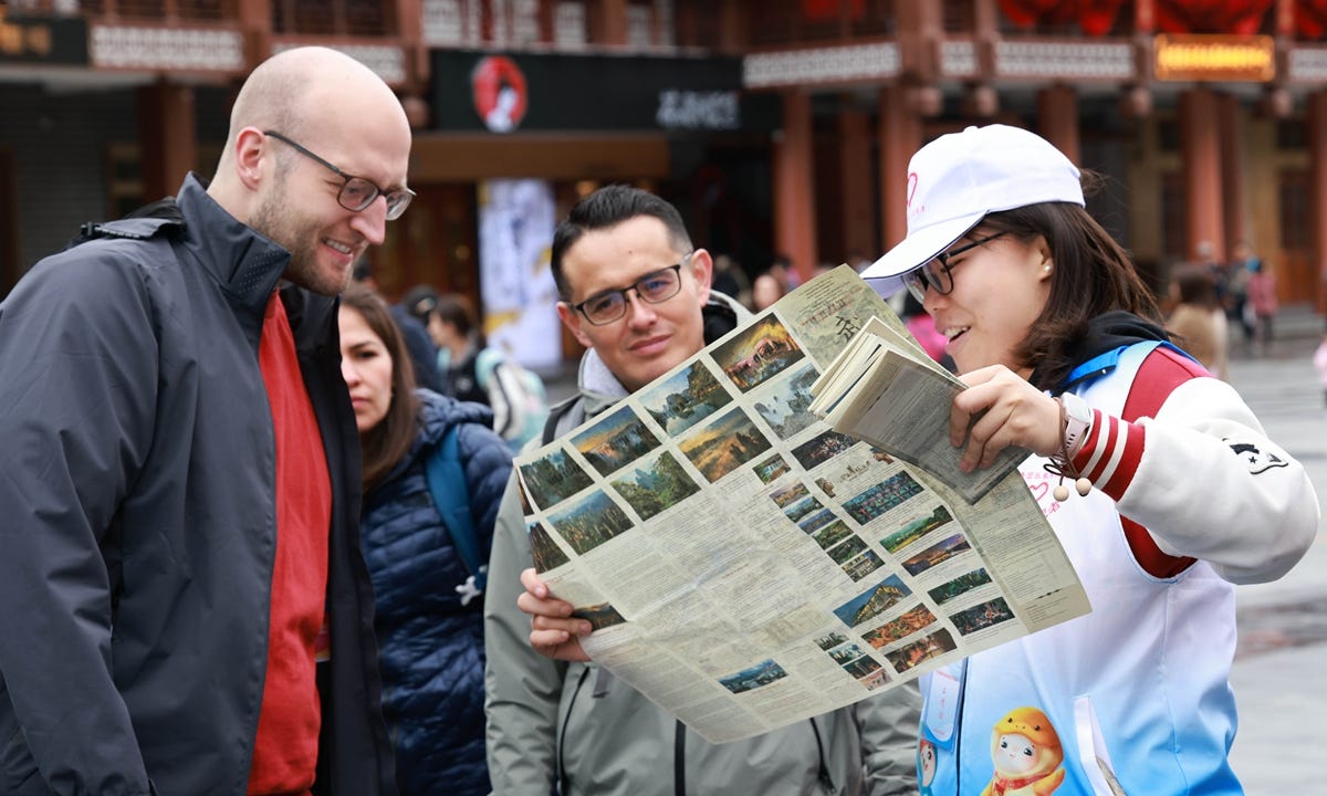 Foreign tourists visit a Zhangjiajie scenic spot in Central China's Hunan Province on May 4, 2024. Photo: VCG