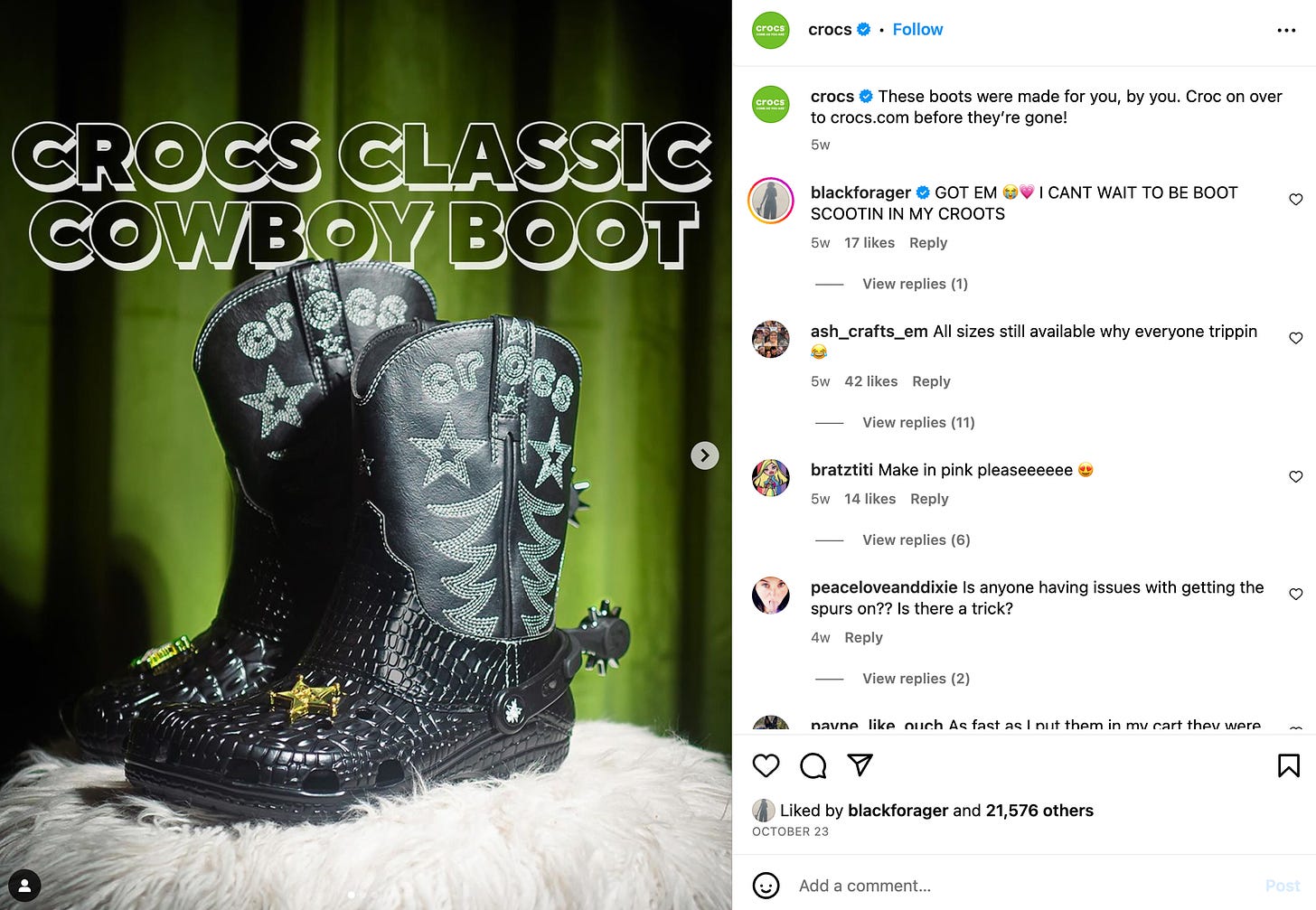 Photo of Crocs Classic Cowboy Boot sitting on a furry pillow in front of a green backdrop.