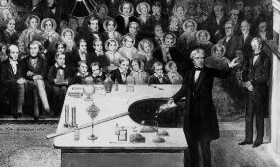 Michael Faraday delivering a Christmas Lecture at the Royal Institution in 1856 / Credits: Wikipedia