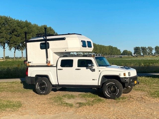 Hummer H3T with camper shell via mobile.de