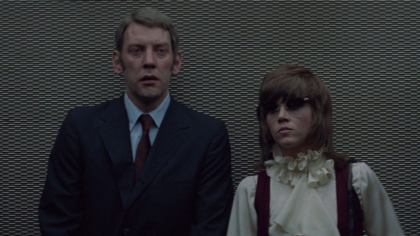 Klute | Still features Donald Sutherland as John Klute and Jane Fonda as Bree Daniels heading up an elevator.