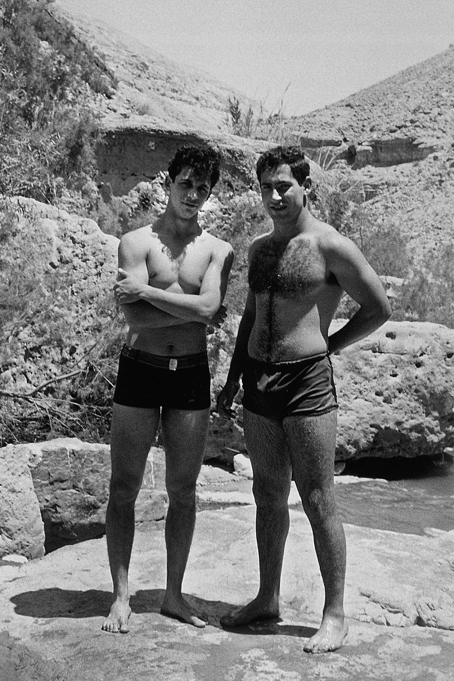 Netanyahu, right, poses with a friend in the Judean Desert in 1968.