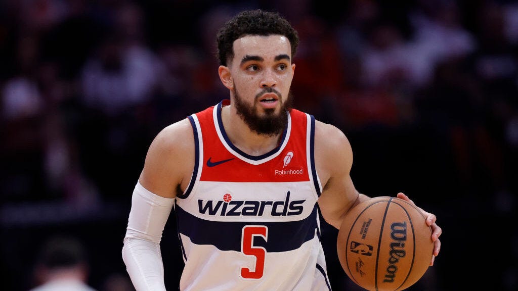 Tyus Jones #5 of the Washington Wizards in action against the Houston Rockets during the first half...