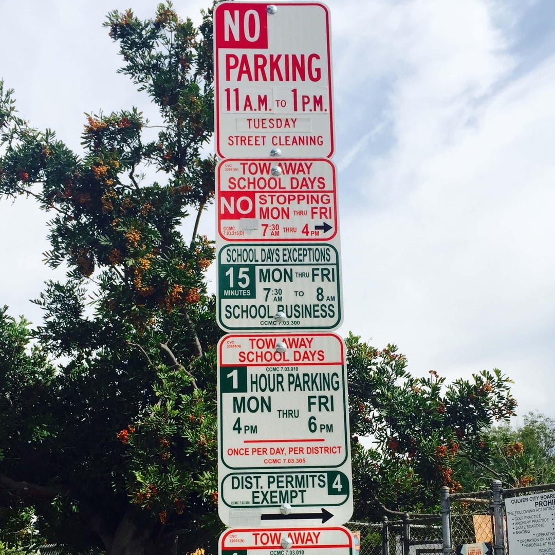 Which font do they use for these parking signs? And are there maybe  look-a-likes? : r/identifythisfont