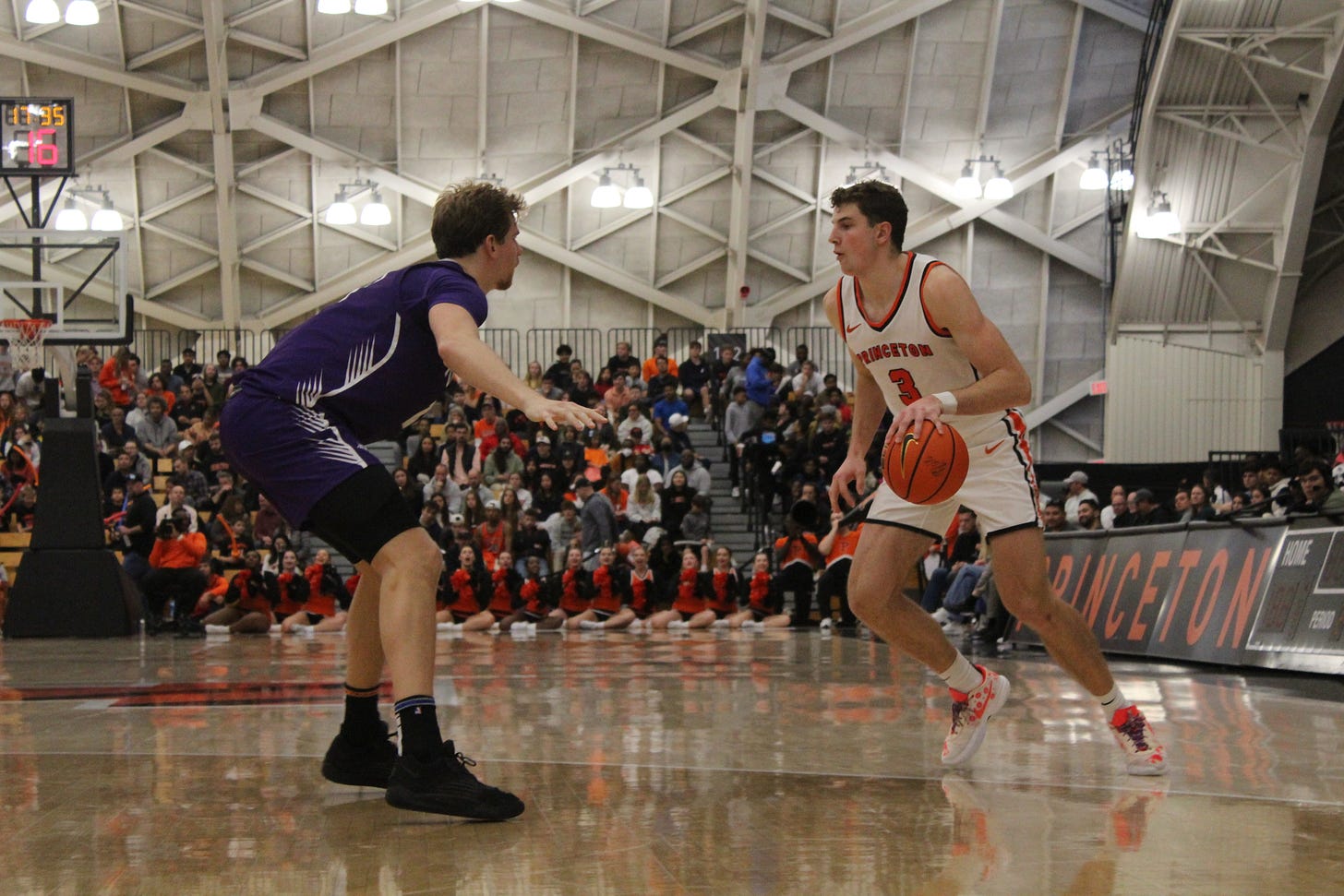 Caden Pierce dribbles during Princeton’s game against Furman on Dec. 2, 2023. (Photo by Adam Zielonka)