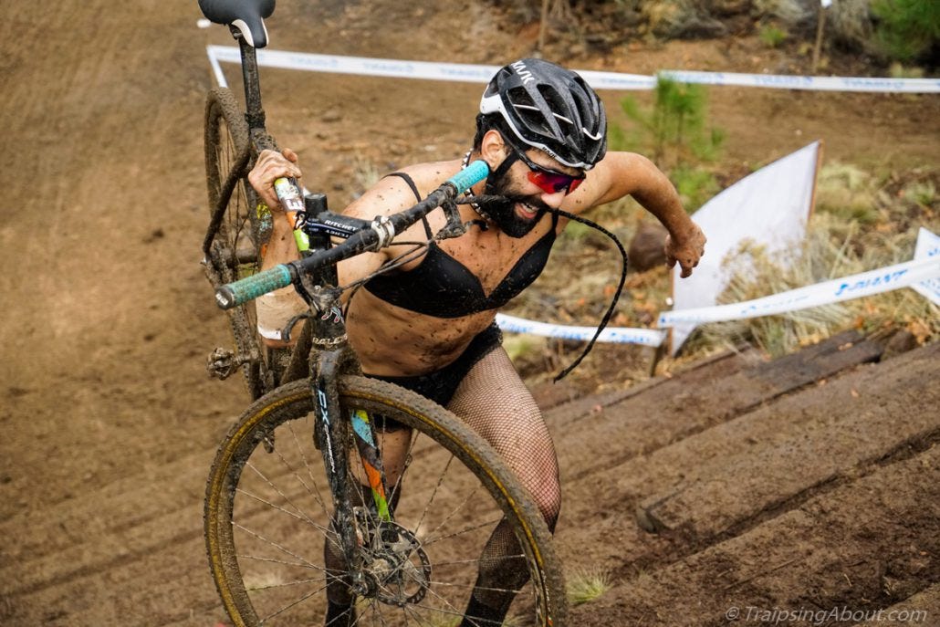 Perfect technique: whip in teeth, fishnet tights, and laser focus.