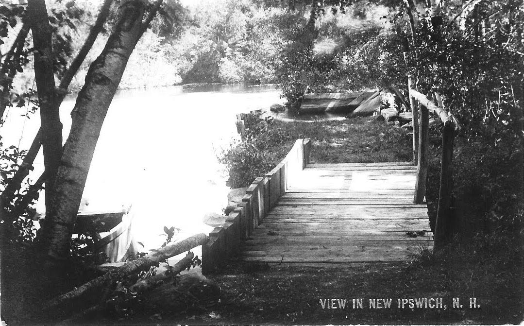 Bridge with boats and water