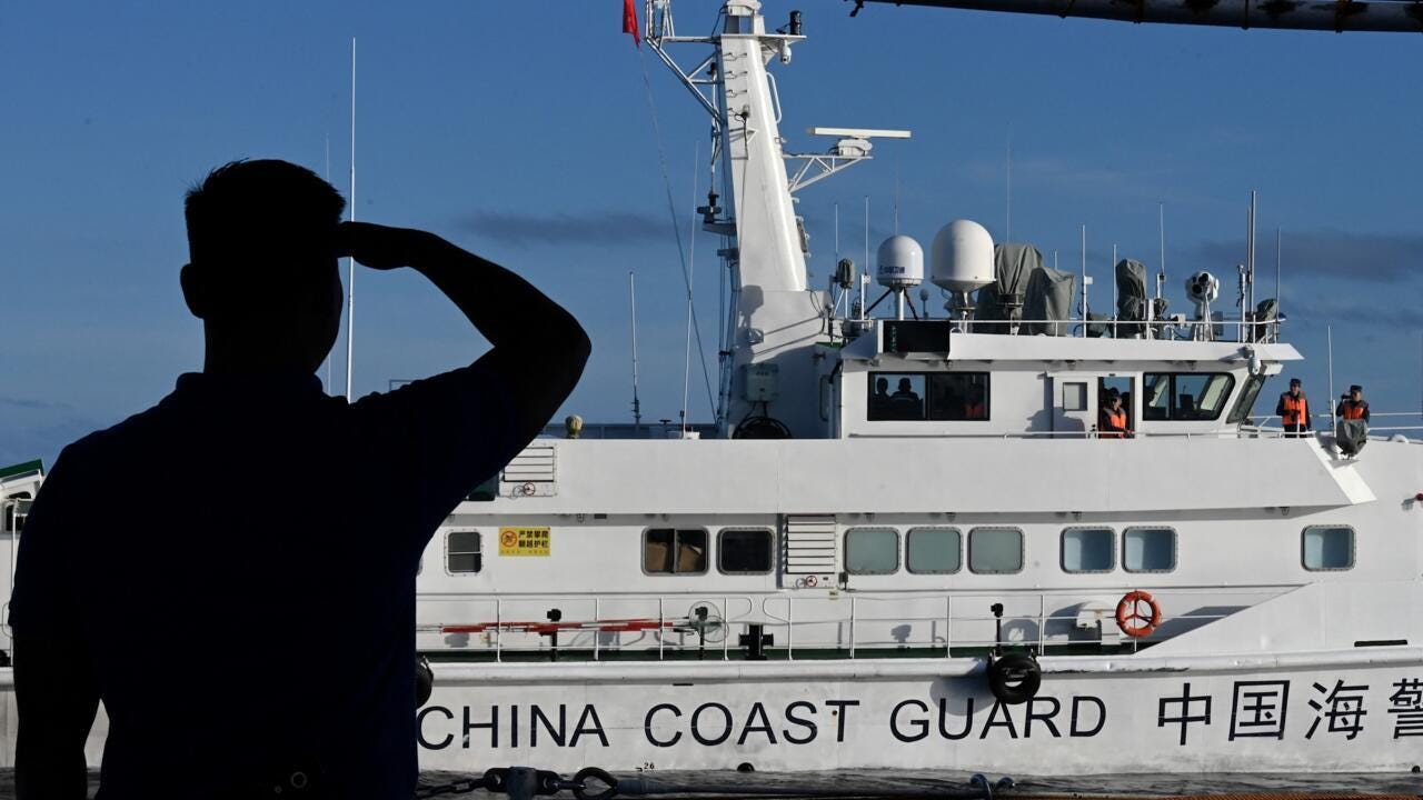 China and US hold rival military drills in disputed South China Sea