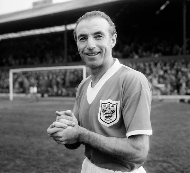 Stanley Matthews of Blackpool celebrates his 600th league appearance before the start of the Football League Division One match between Blackpool and...