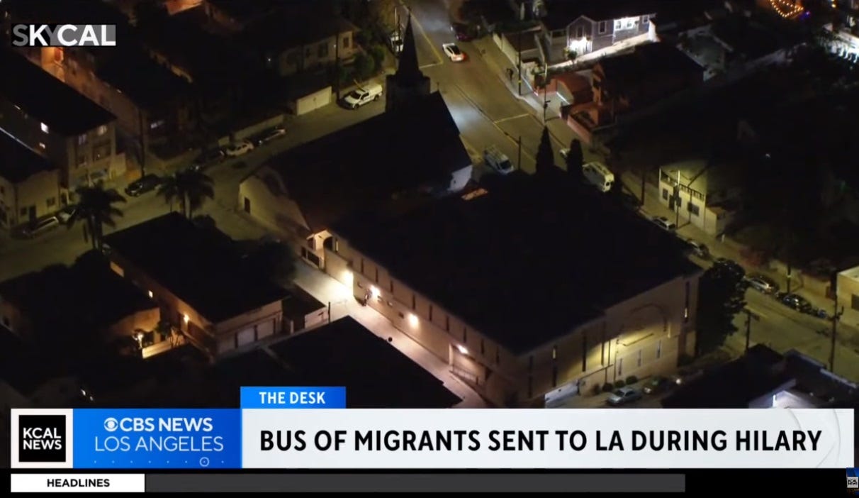 Video screenshot of an aerial view of a Los Angeles church that has become an unofficial welcome center for migrants bused to LA by Greg Abbott