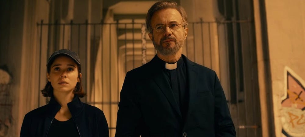 Alba Baptista as Ava and Tristán Ulloa as Father Vincent (Credit: Netflix)
