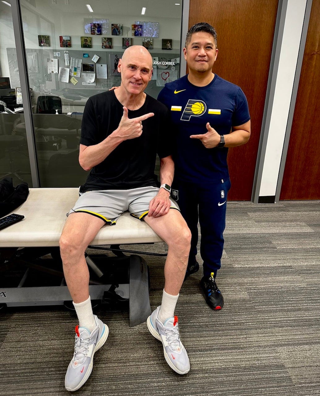 Dr. Philip Anloague with Pacers head coach Rick Carlisle.