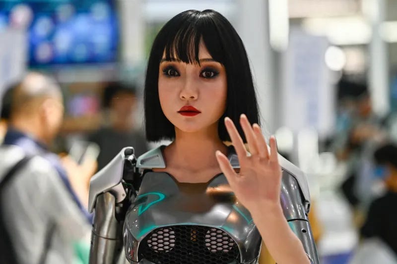 A humanoid robot gestures at the World Intelligence Expo in Tianjin on June 23, 2024.