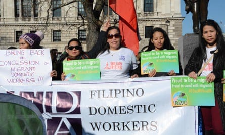 Filipino domestic workers rally outside the Houses of Parliament in 2018.