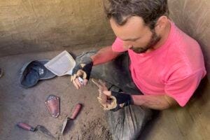 François Lanoë, an assistant research professor at the University of Arizona's School of Anthropology, helped uncover an 8,100-year-old canine jawbone in interior Alaska in June 2023. Alongside a 12,000-year-old leg bone found nearby, these discoveries provide some of the earliest evidence of close relationships between ancient dogs, wolves, and humans in the Americas.