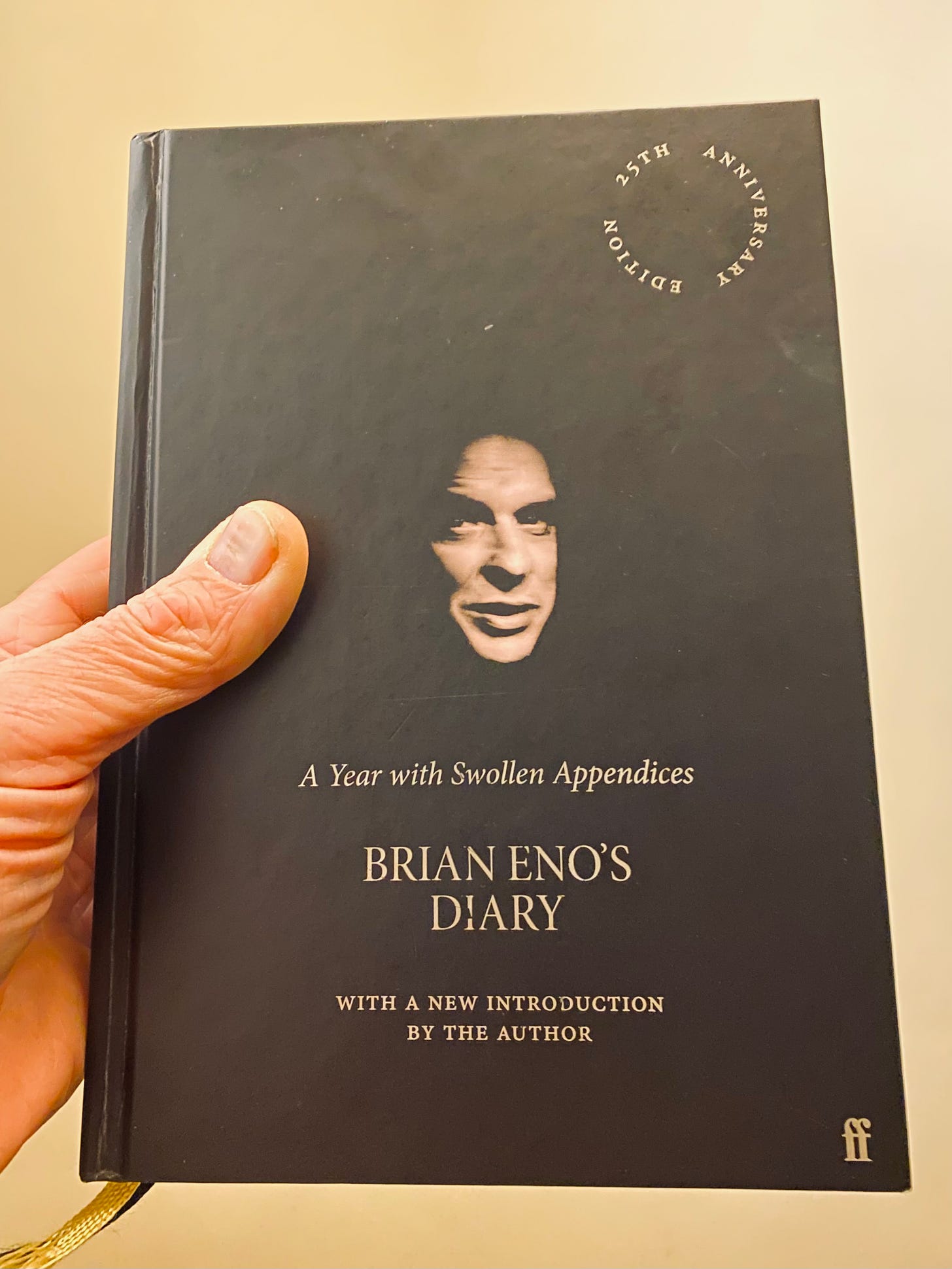 A book with Brian Eno's head in the middle