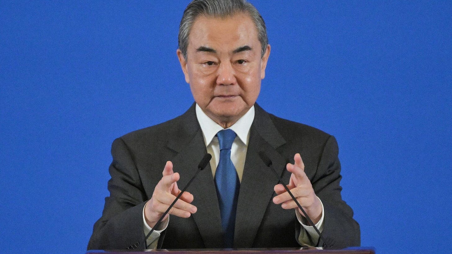 China's Foreign Minister Wang Yi attends a seminar on International Situation and China's Diplomacy in 2023, at the Diaoyutai State Guest House in Beijing on January 9, 2024.  - Sputnik International, 1920, 09.01.2024