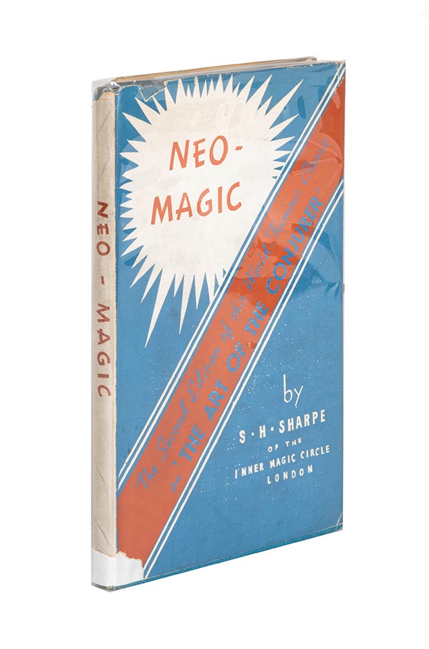 A blue, white and red coloured book with the title "Neo-Magic".