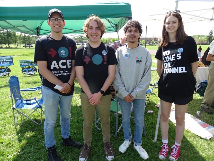 Four people standing outside