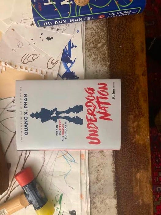 May be an image of map, book and text