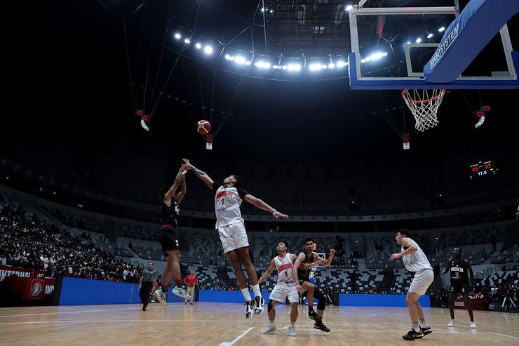 picture of the indonesian national basketball team playing the indonesian patriots at the Indonesia International Basketball Invitational