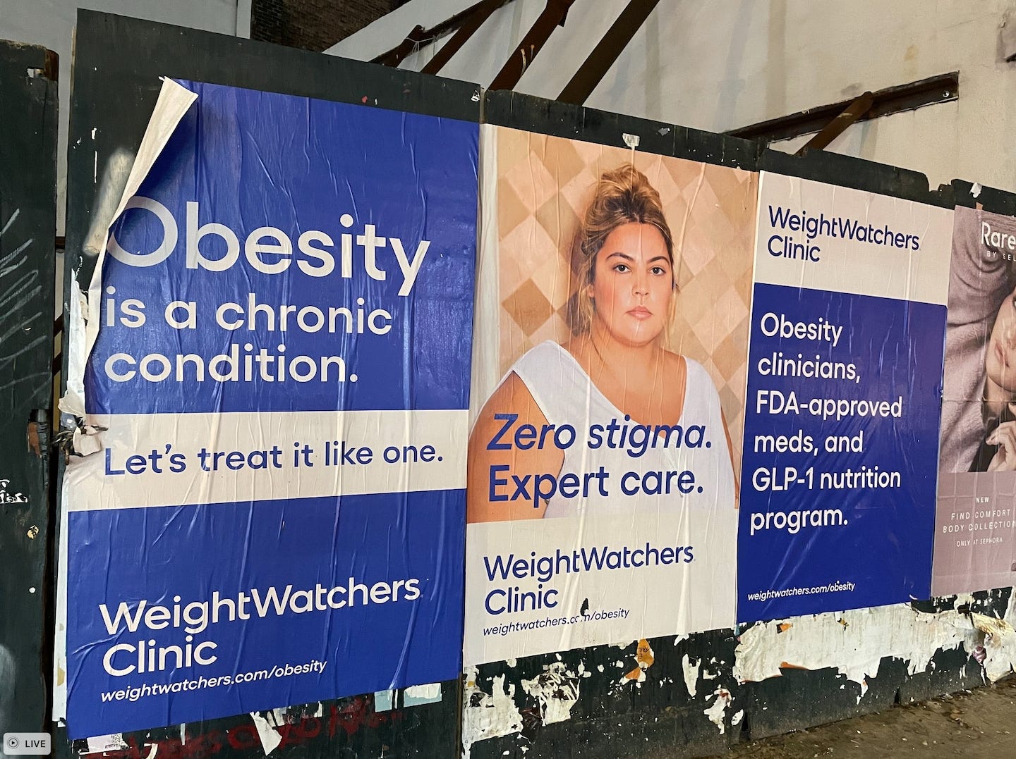 WeightWatchers Clinic advertisement poster on a wall in Manhattan