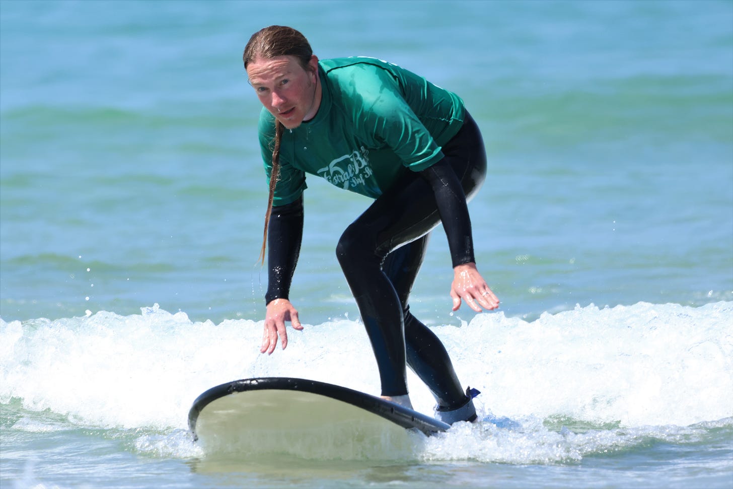 P M Buchan learning (badly) to surf in Newquay.