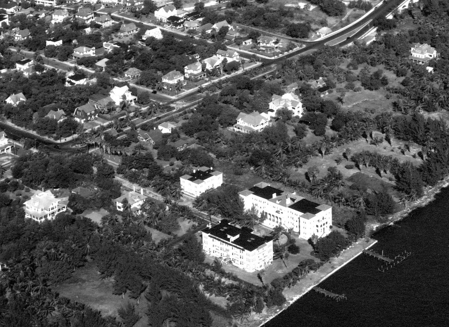 Figure1: Aerial view of Brickell neighborhood in the 1930s. The Brickell and Bulmer apartments can be seen in the foreground. William III's two mansions can be seen in the center of the photograph.