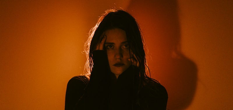 Woman staring at Camera