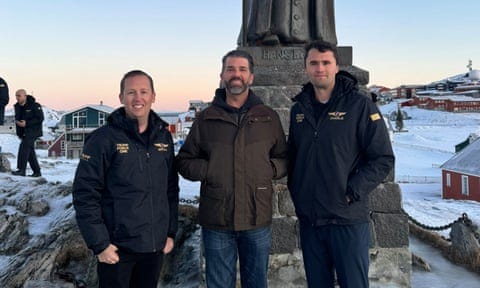 Donald Trump Jr in front of the statue of Hans Egede in Nuuk, Greenland, while on a private visit.