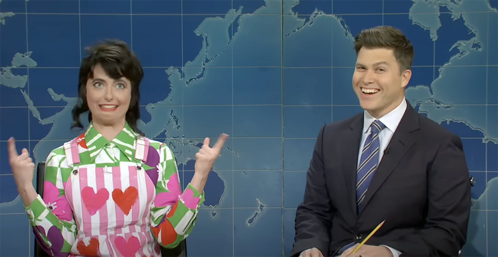 Sarah Sherman and Colin Jost on the Weekend Update set on Saturday Night Live