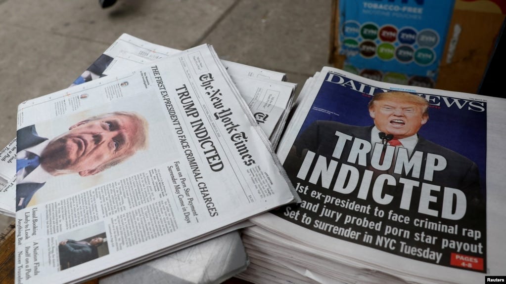 New York newspapers are displayed at a newsstand following former U.S. President Donald Trump's indictment by a Manhattan grand jury following a probe into hush money paid to porn star Stormy Daniels, in New York, March 31, 2023. 