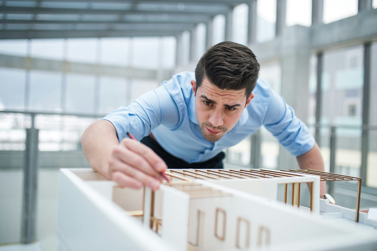 Architect working on a model