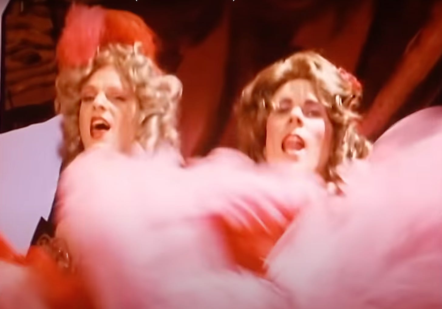 Andy Bell and Vince Clarke dressed in drag as can-can girls in the music video for "Who Needs Love Like That" 