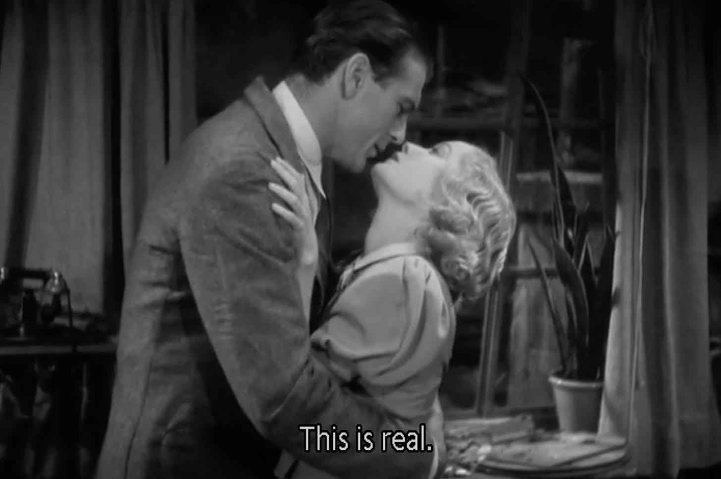 Gary Cooper embracing Marlene Dietrich in "Morocco" (1930)