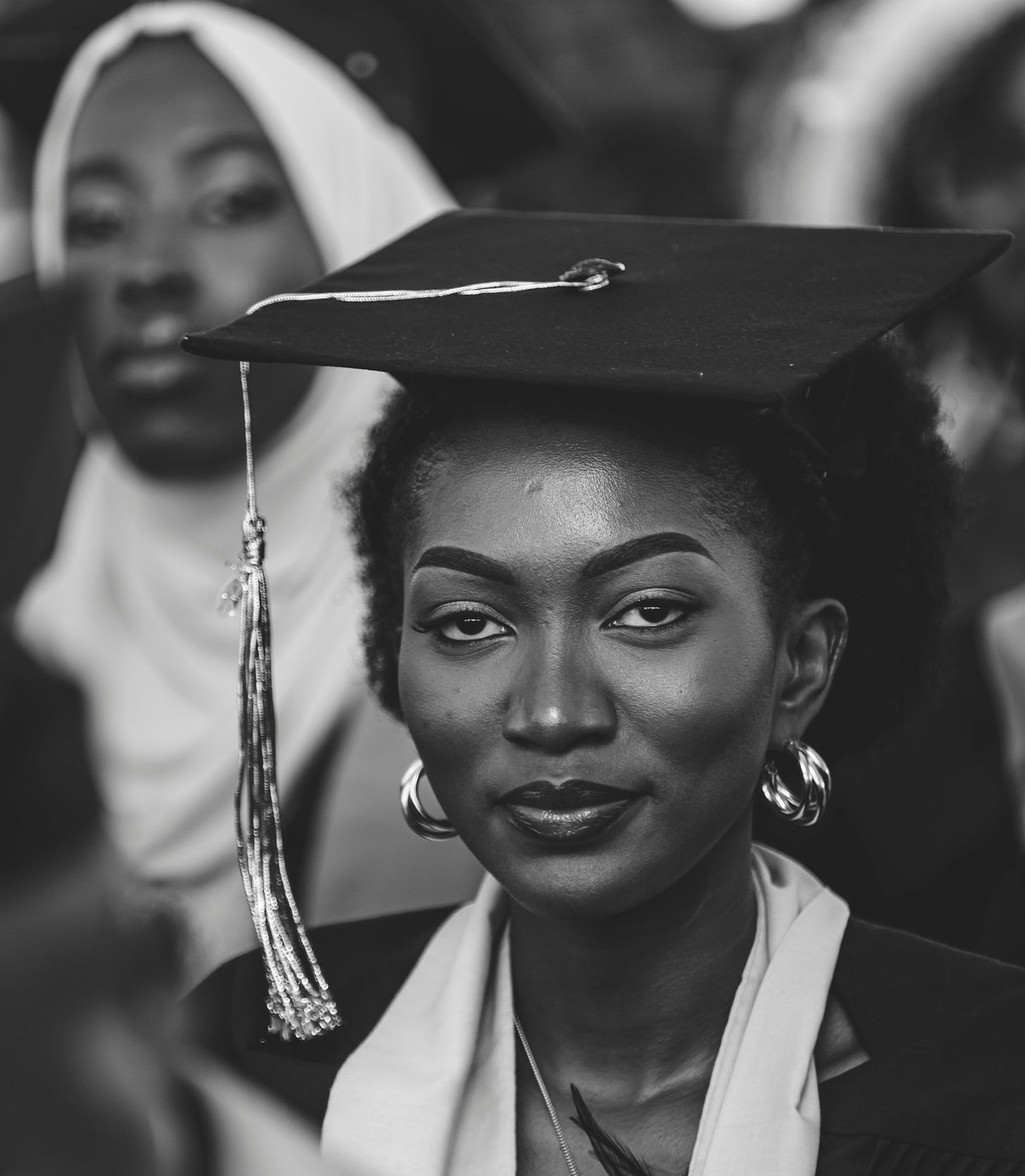 Black woman in cap and gown