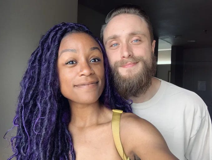 Crystal and Bryan pose for a selfie together.